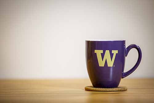 Purple coffee mug with UW logo